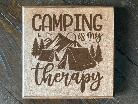 Set of four wood burned coasters with (Camping is my therapy).