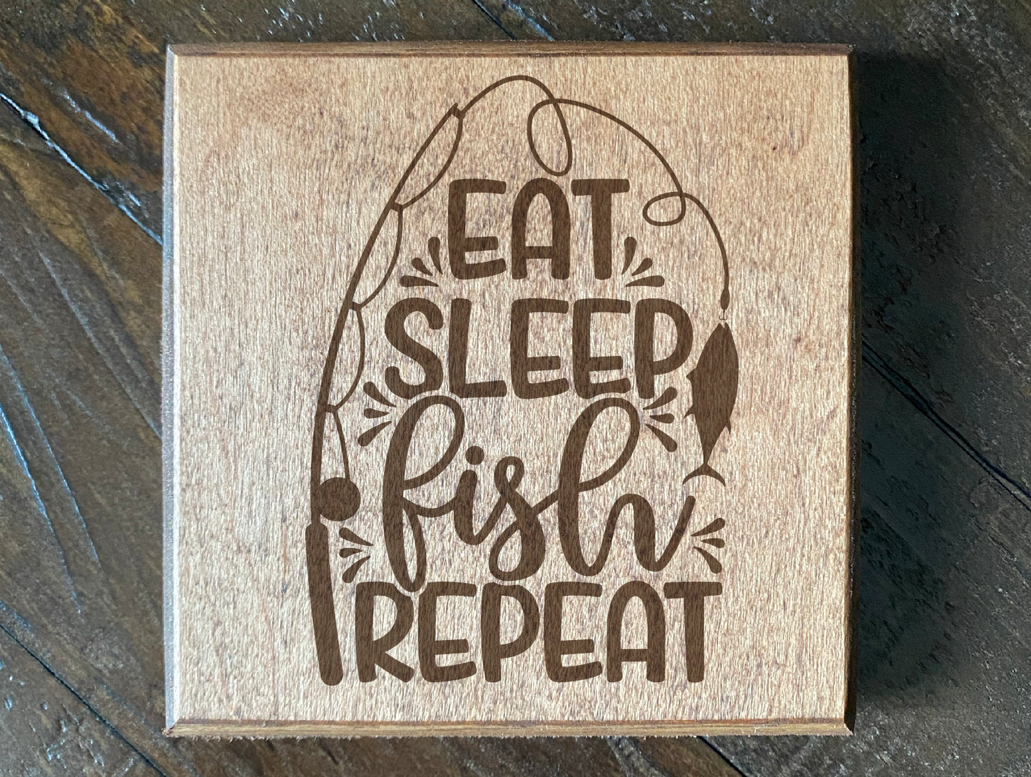 Set of four wood burned coasters with (Eat sleep fish repeat).