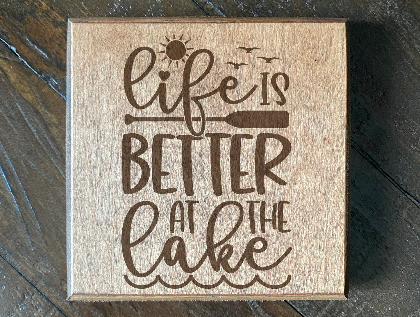 Set of four wood burned coasters with (Life is better at the lake).