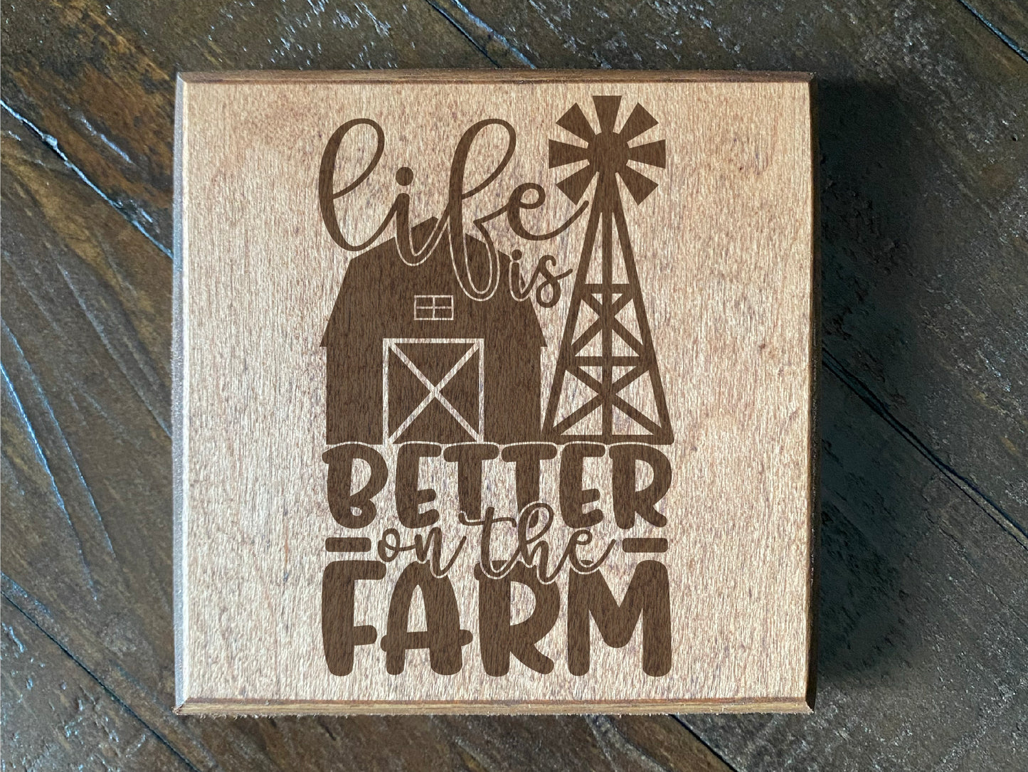 Set of four wood burned coasters with (Life is better on the farm).