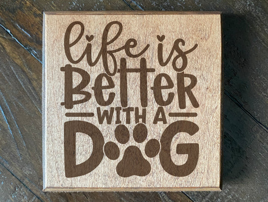 Set of four wood burned coasters with (Life is better with a dog).