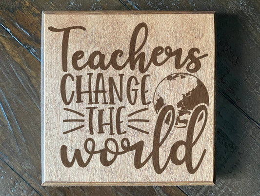 Set of four wood burned coasters with (Teachers change the world).