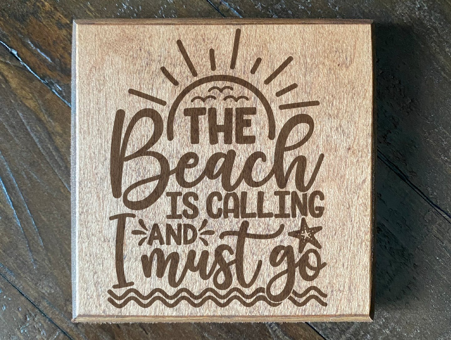 Set of four wood burned coasters with (The beach is calling and i must go).