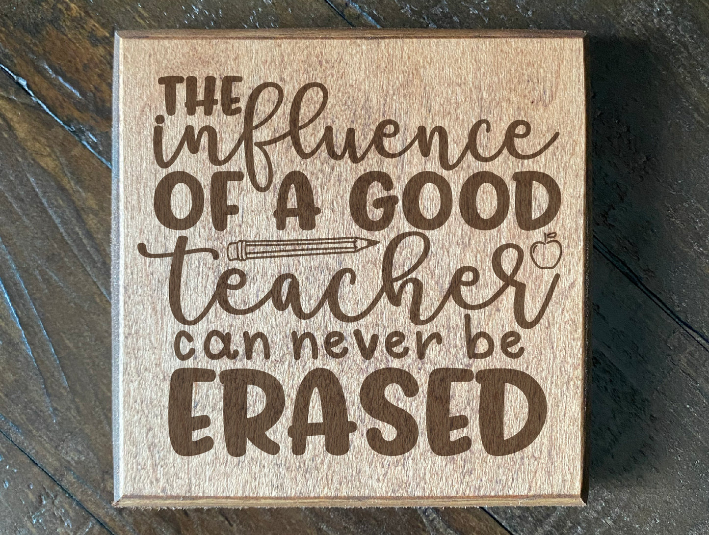 Set of four wood burned coasters with (The influence of a good teacher can never be erased).